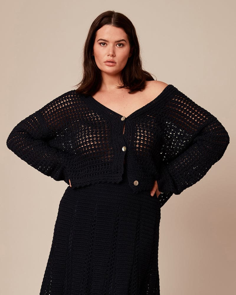 Front of a model wearing a size 2X Crochet Cardigan in Navy by Vince. | dia_product_style_image_id:235456